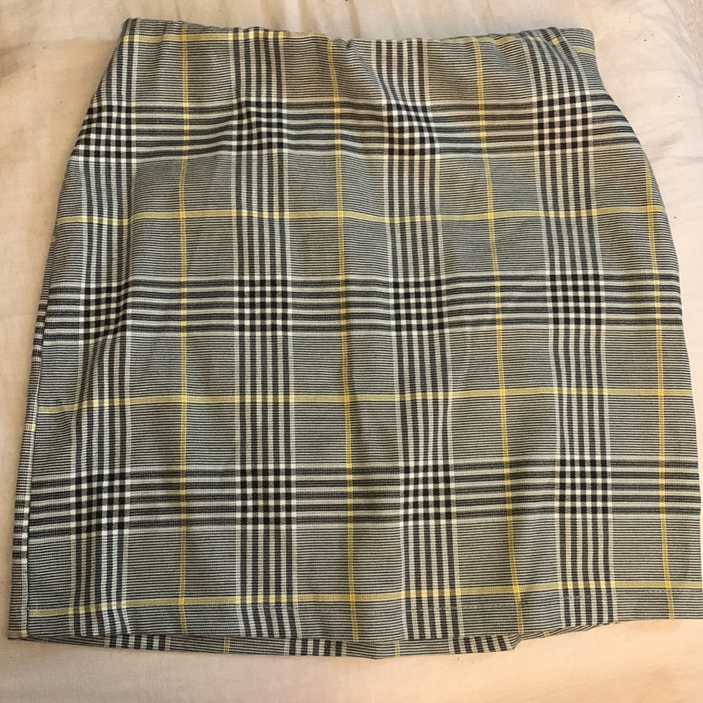This Plaid Skirt! Very comfortable and Fitting.
